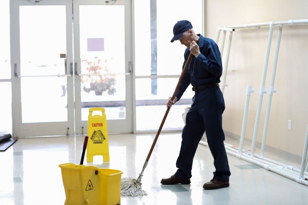 janitor cleaning the lobby