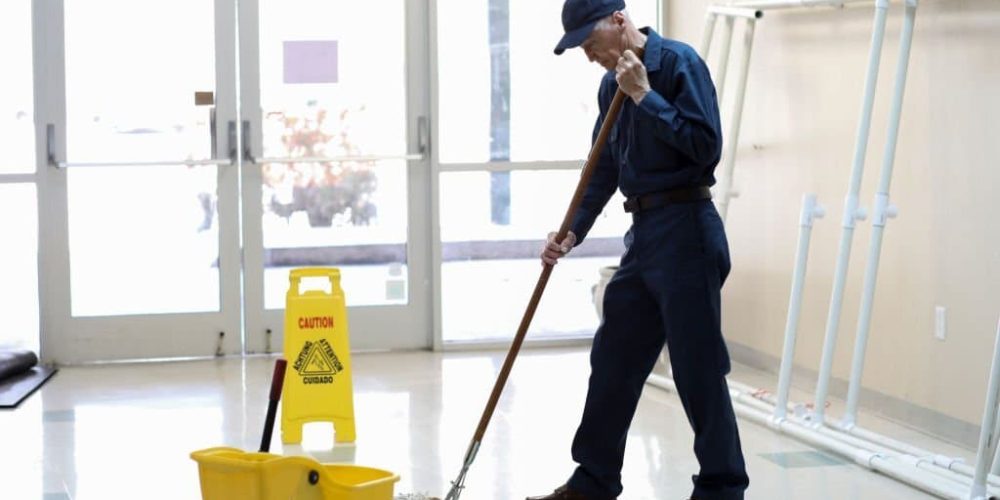 janitor cleaning the lobby